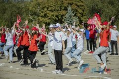 Активисты «Движения первых» из ЛНР провели флешмоб в честь Дня воссоединения с Россией